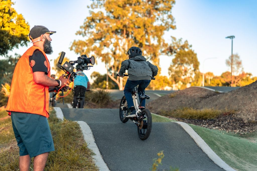 C4Creativity videographer filming kids riding BMX bikes at a Brisbane park